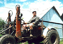 Valeriy works on the tractor